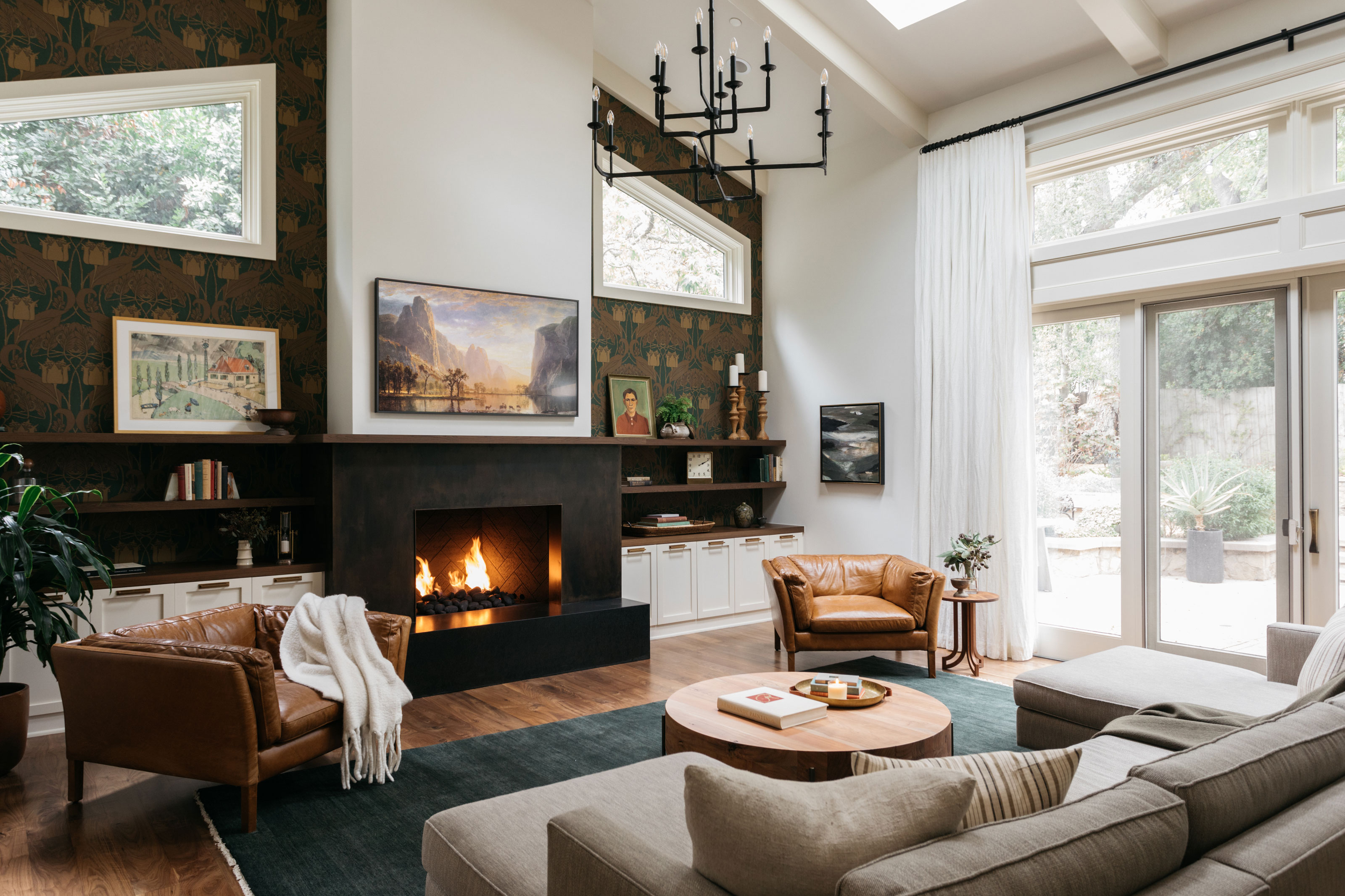 Elegant living room with patterned wallpaper
